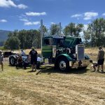 Semi truck showing custom engine, paint, wheels, pipes and interior at the Chiefs Car Show 2025
